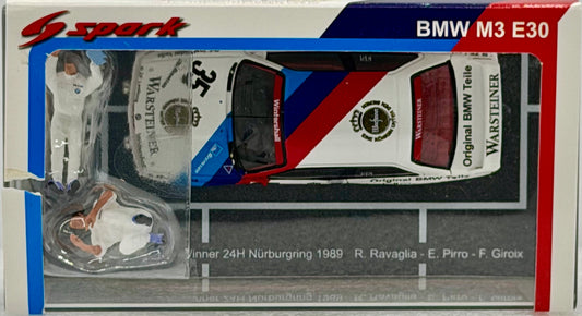 Model car packaging for a BMW M3 E30 with racing livery, featuring the Spark logo.